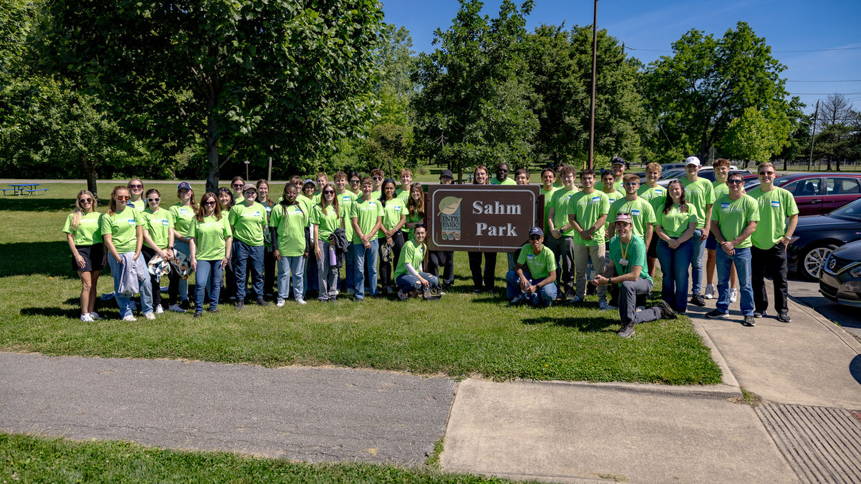 Team volunteering at Sahm Park, employee benefits and perks.