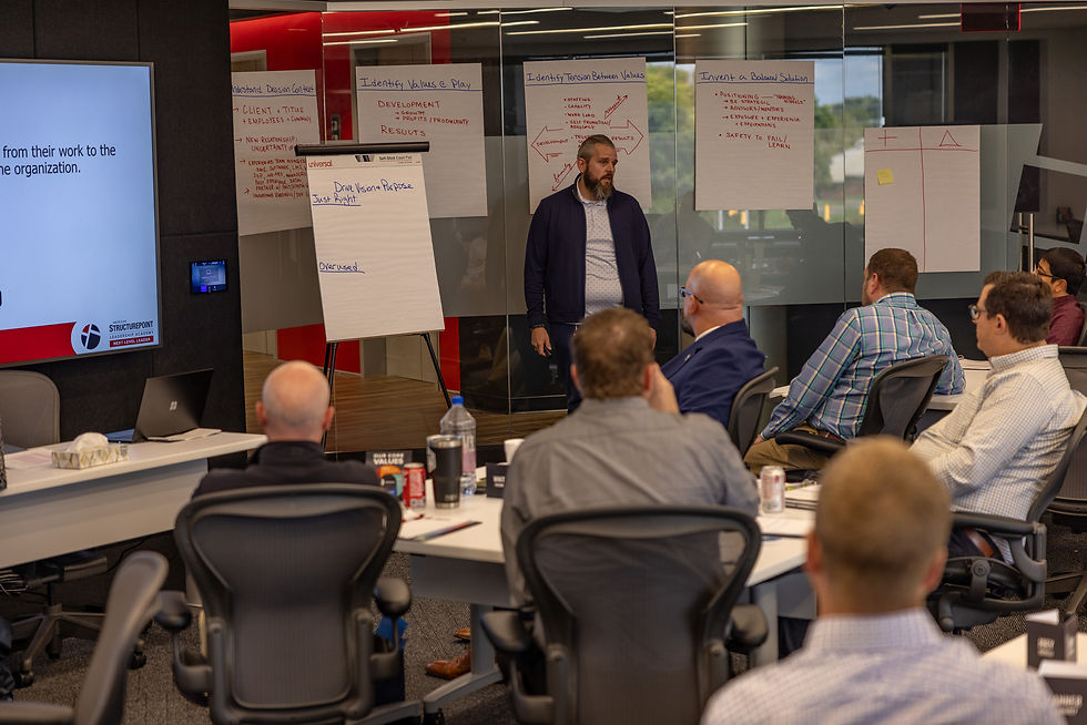 Team workshop discussing employee benefits and perks.