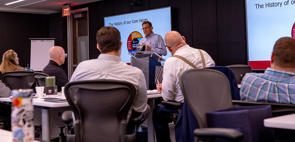 Employees in a meeting about employee benefits and perks