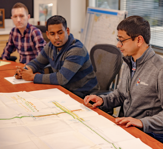 Engineers reviewing plans for American Structurepoint careers