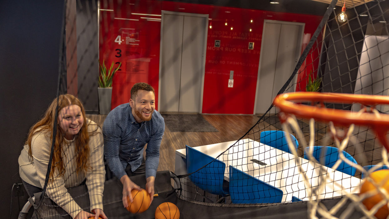 Colleagues enjoying fun employee benefits and perks.