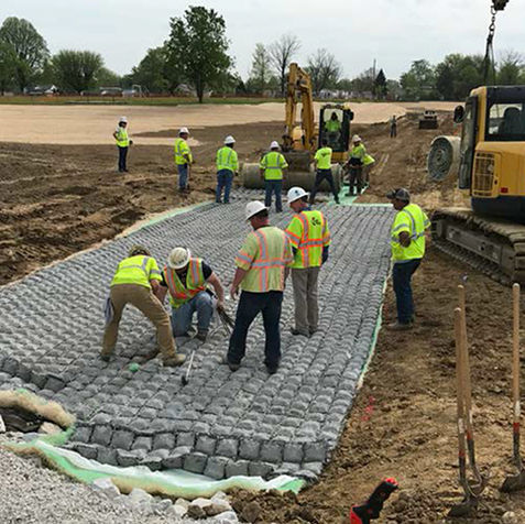 Crew providing stormwater engineering services at a site.