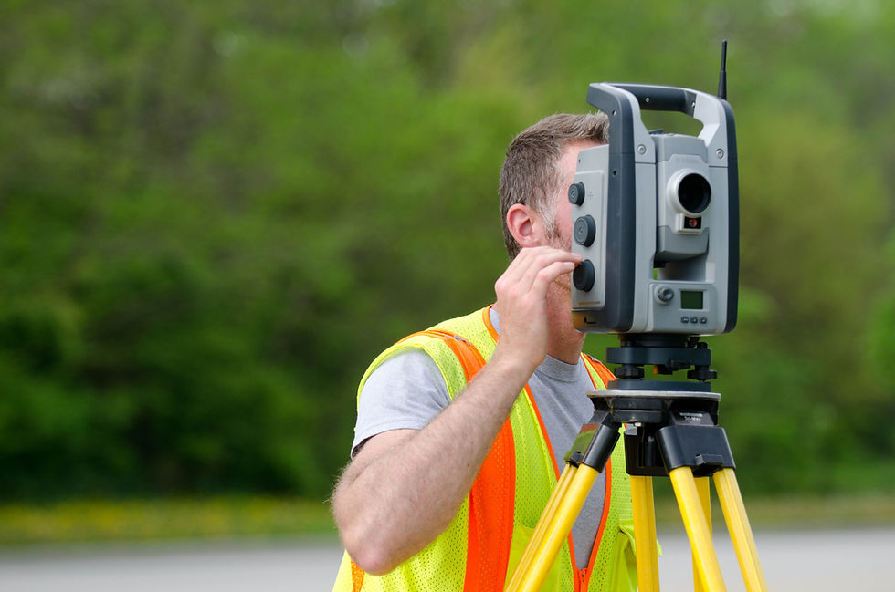 Professional land surveying services using a total station.