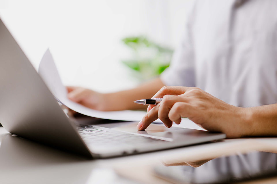 Professional working on marketing and communications services.