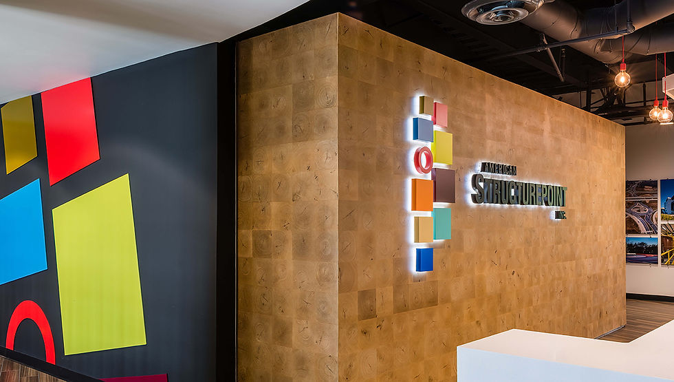 Modern office lobby showcasing marketing and communications services.