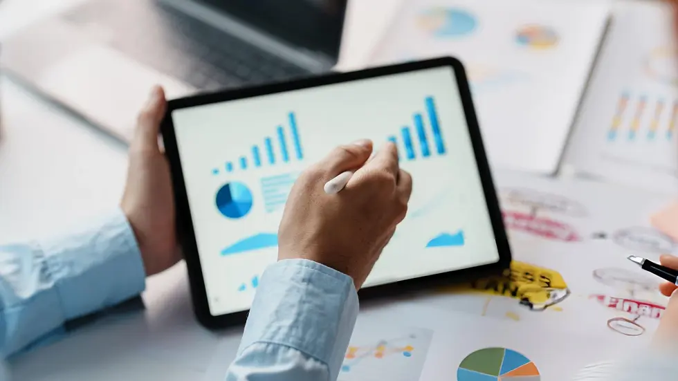 Professional analyzing growth charts for IT consulting services.
