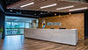 Modern reception desk at American Structurepoint office.