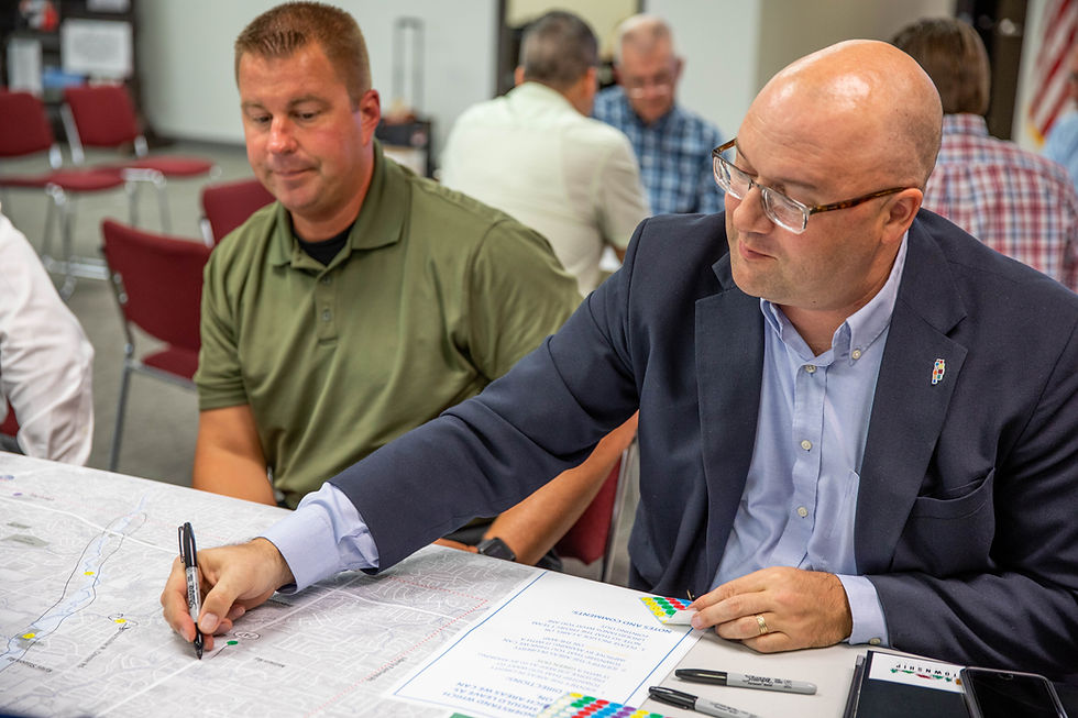 American Structurepoint team reviewing project blueprints.